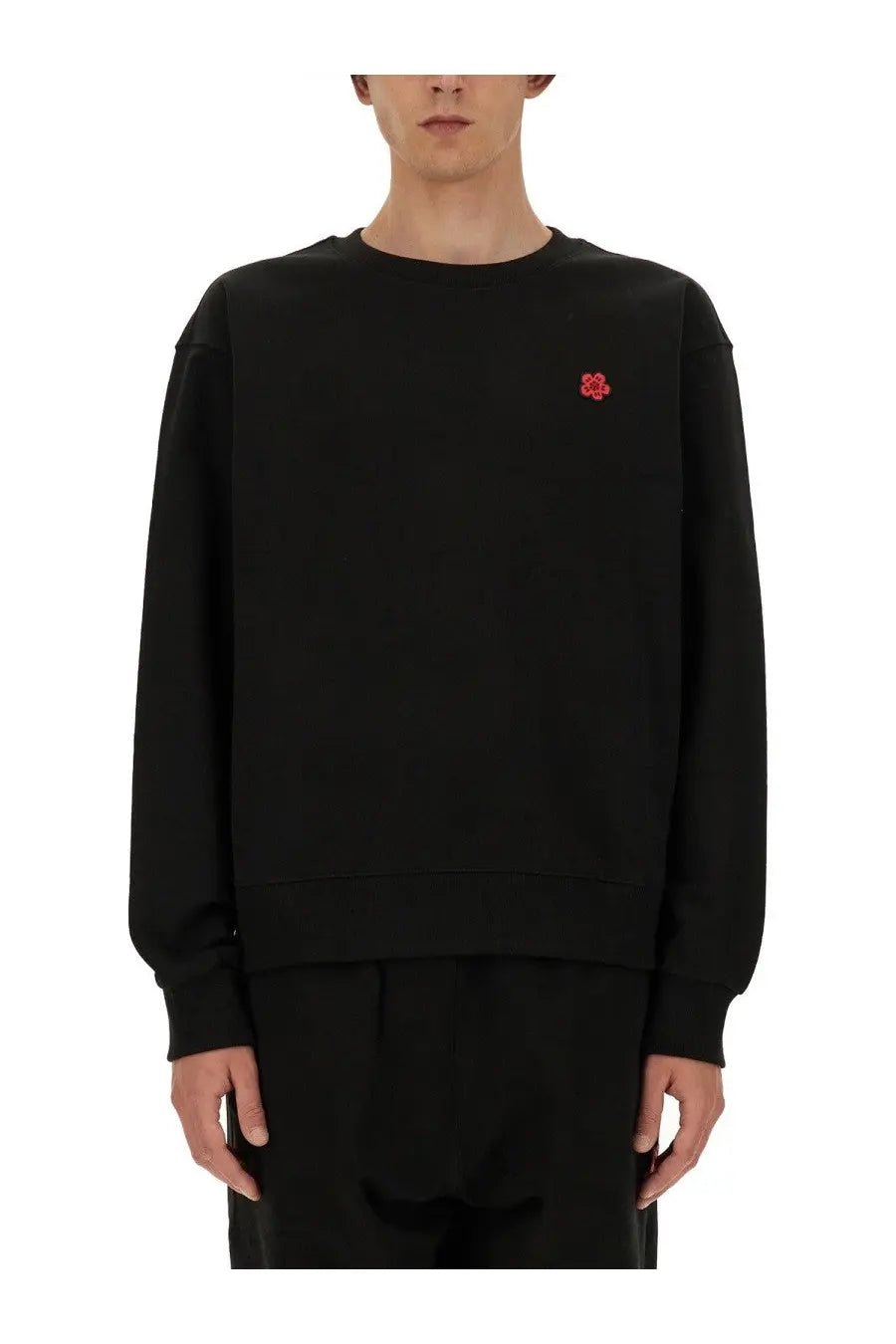 Kenzo men’s black crewneck sweatshirt with small red embroidered boke flower on left chest for casual wear
