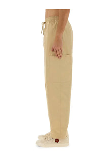 Kenzo men’s beige cargo jogging pants with elastic waistband drawstring and large thigh front pocket