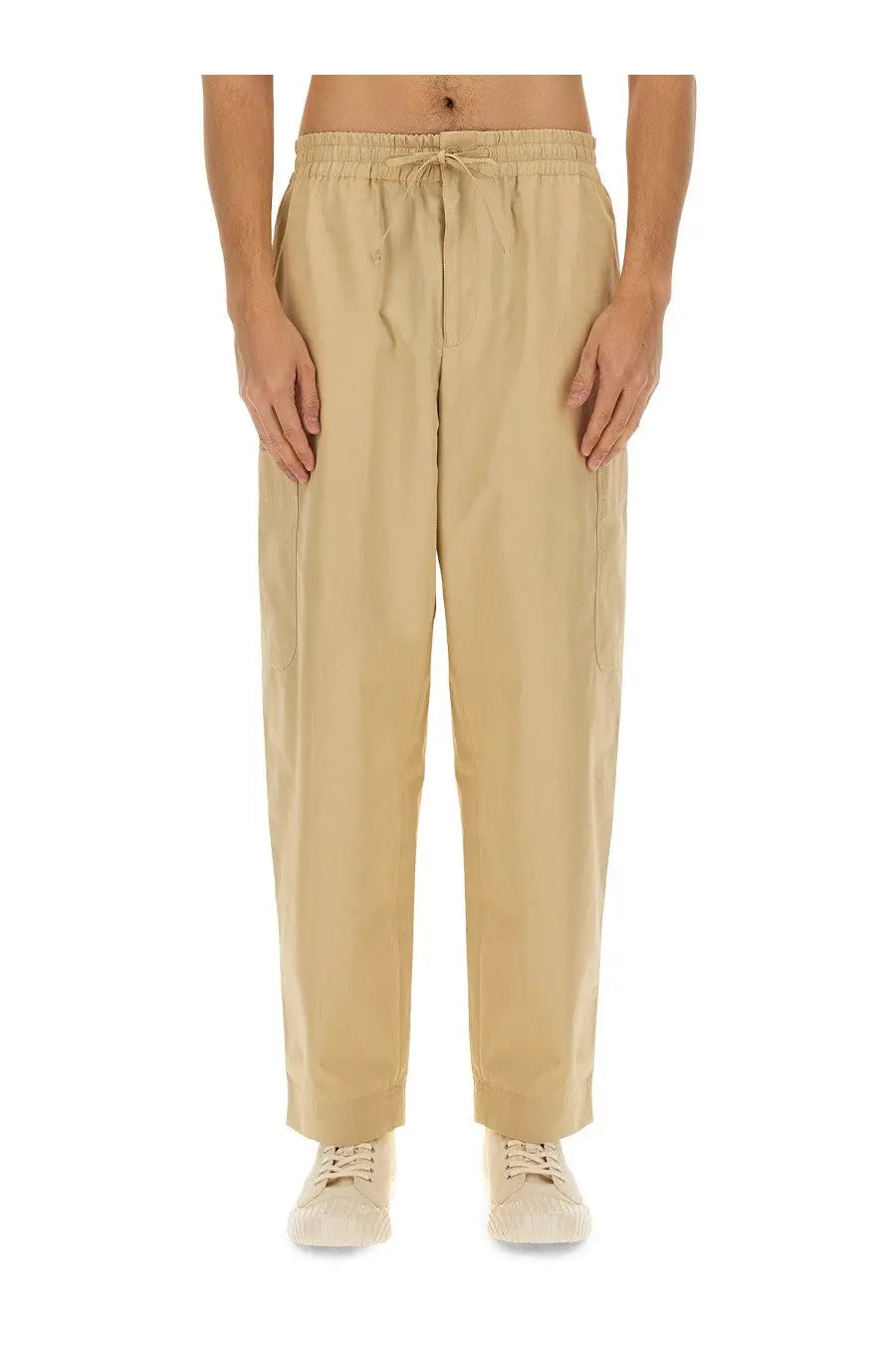 Beige kenzo men’s cargo jogging pants with relaxed fit drawstring waist and subtle vertical seam detailing