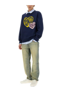 Navy blue kenzo paris sweatshirt with bold yellow and pink heart logo featured in kenzo men’s slim bara jeans varsity blue product