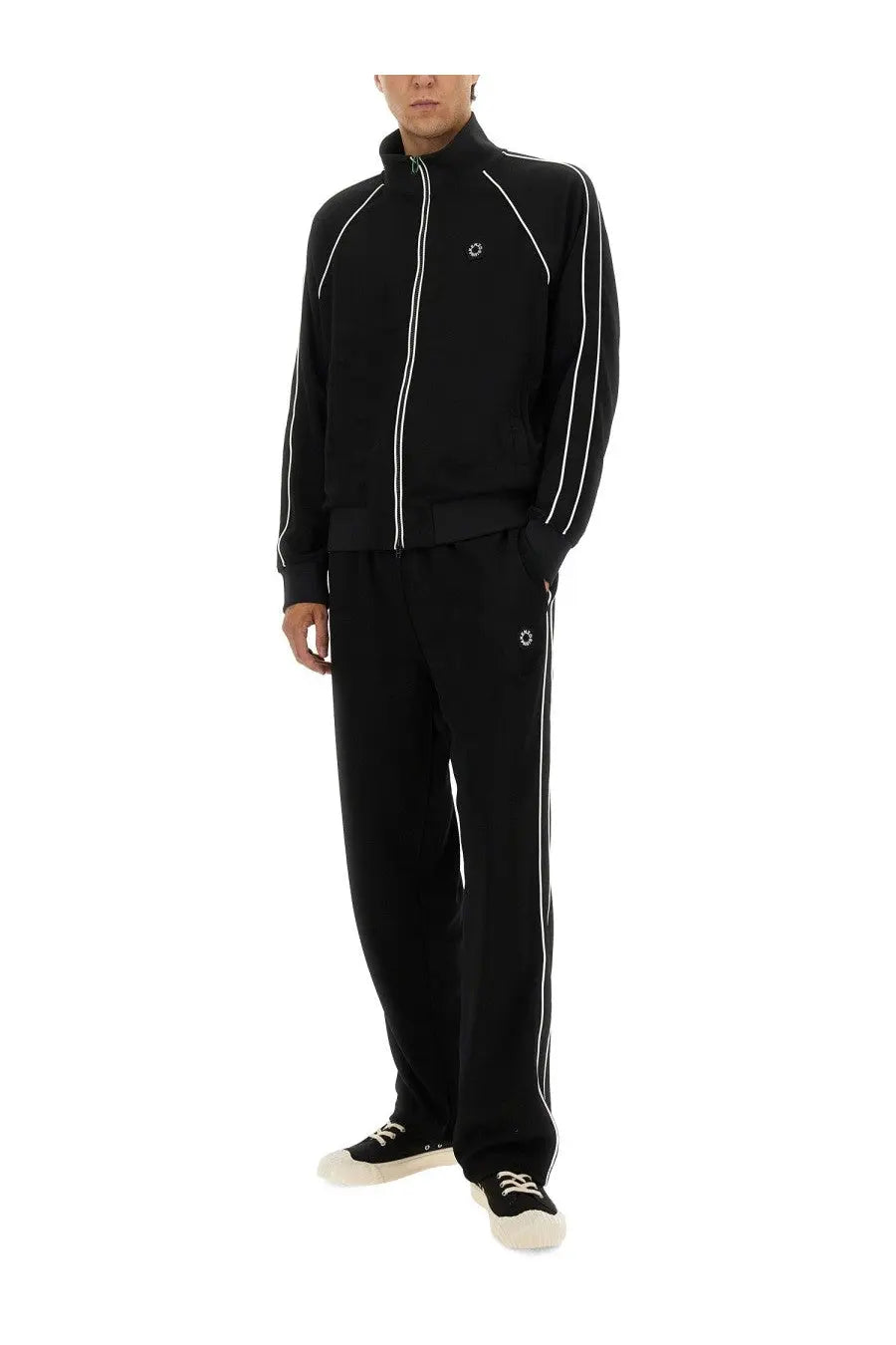 Black fred perry track suit with white piping and logo detailing shown from the front in kenzo men’s track pants boke flower black