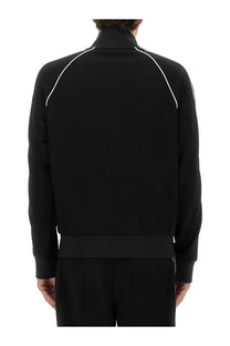 Kenzo men’s black zippered track sweatshirt with white contrast stitching along shoulders and sleeves
