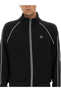 Kenzo men’s black track jacket with white piping and circular chest logo designed for casual wear