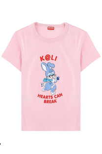 Pink short-sleeved Kenzo women’s t-shirt with blue cartoon rabbit and red k@li hearts can break text by keiko