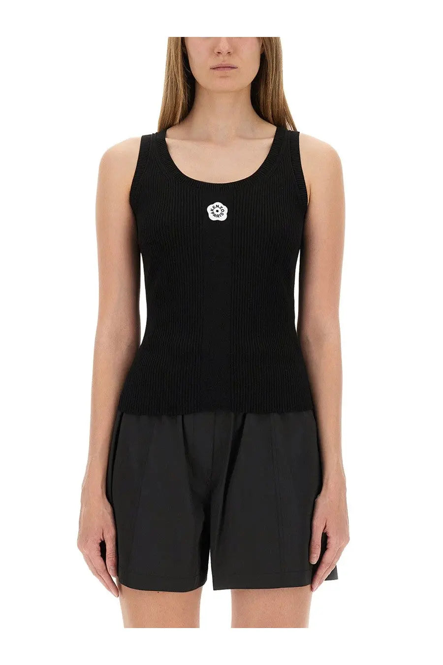 Kenzo women’s black ribbed knit sleeveless tank top with a white floral emblem at the center chest