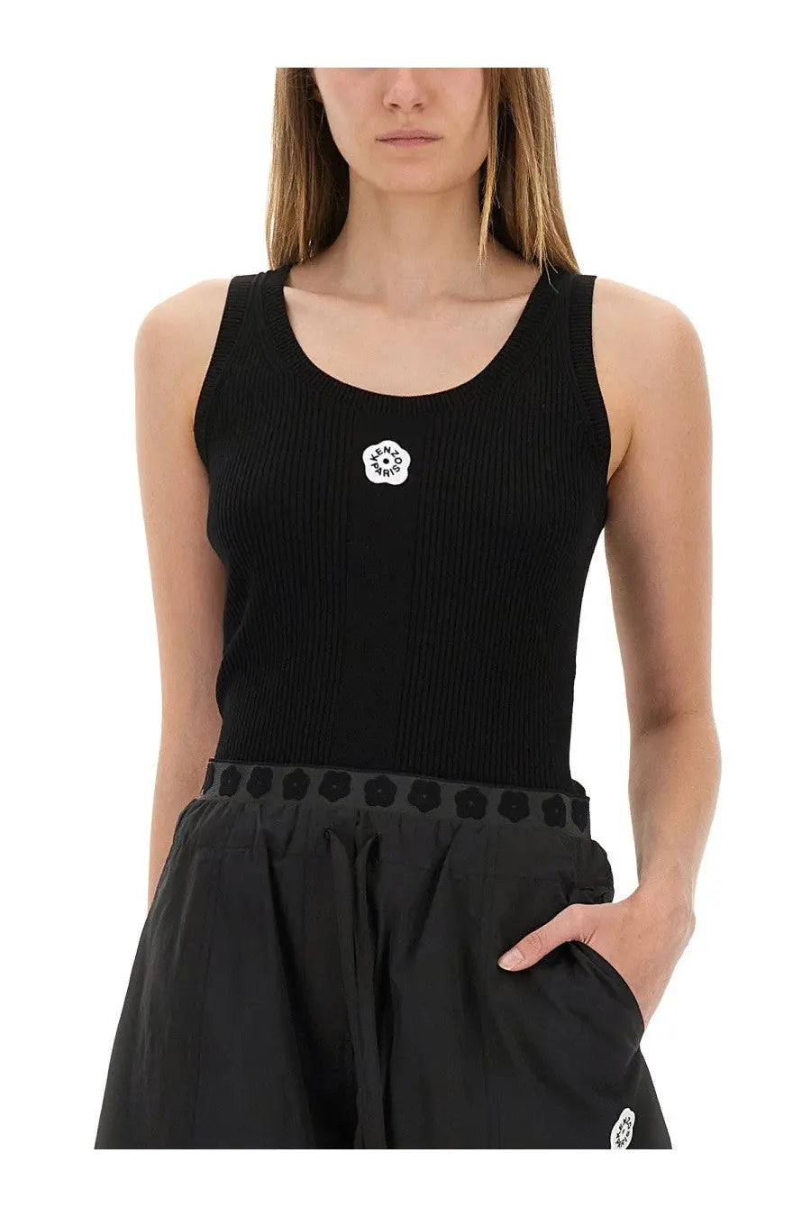 Kenzo women’s black ribbed knit tank top featuring a white floral emblem on the chest
