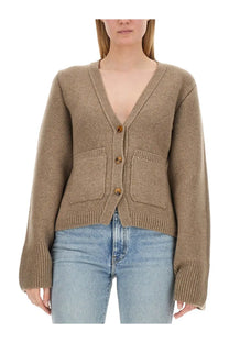 Khaite women’s cozy camel-colored knitted cardigan with v-neck wooden buttons and front pockets in scarlet beige
