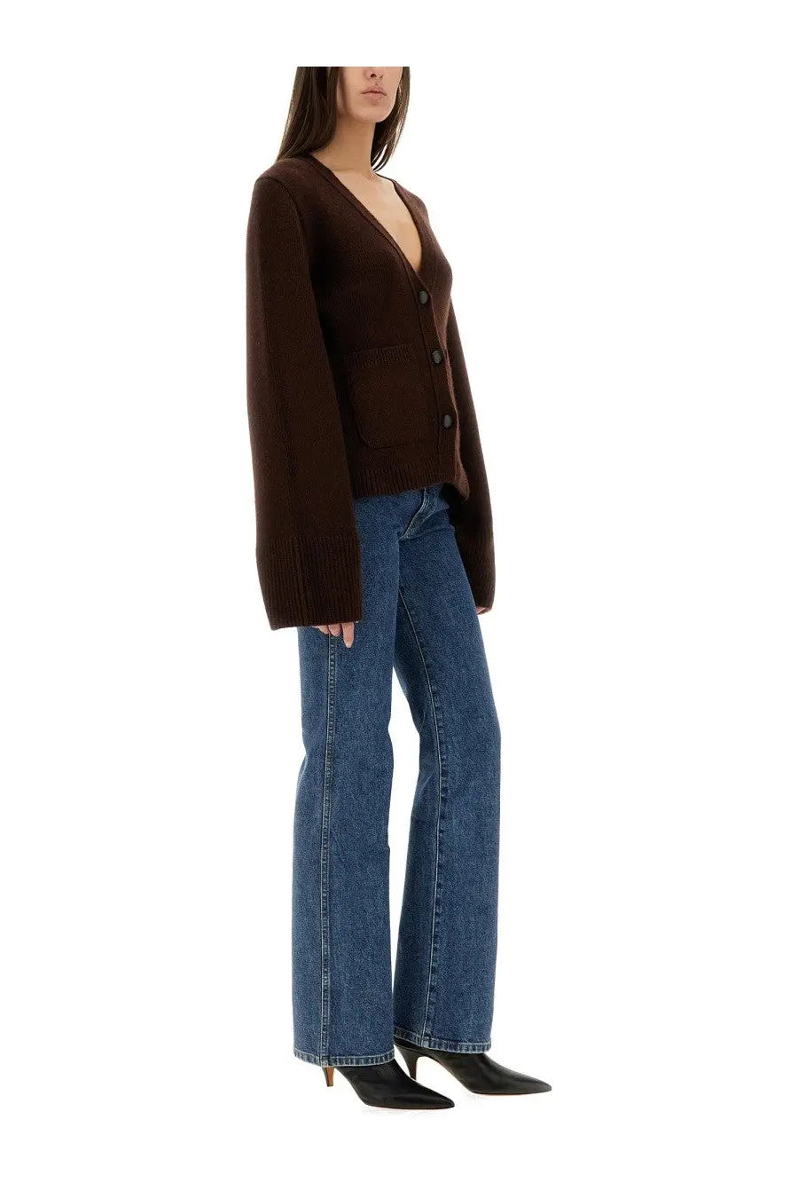 A rich brown long-sleeved knit cardigan with v-neck and button closure complementing khaite women’s jeans danielle blue