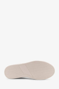Beige rubber sole with subtle wavy texture on kiton men’s white leather sneakers in minimalist design