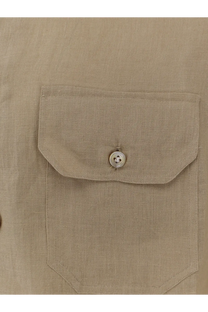 Beige linen shirt pocket with silver button on kiton men’s linen shirt showcasing quality fabric and design