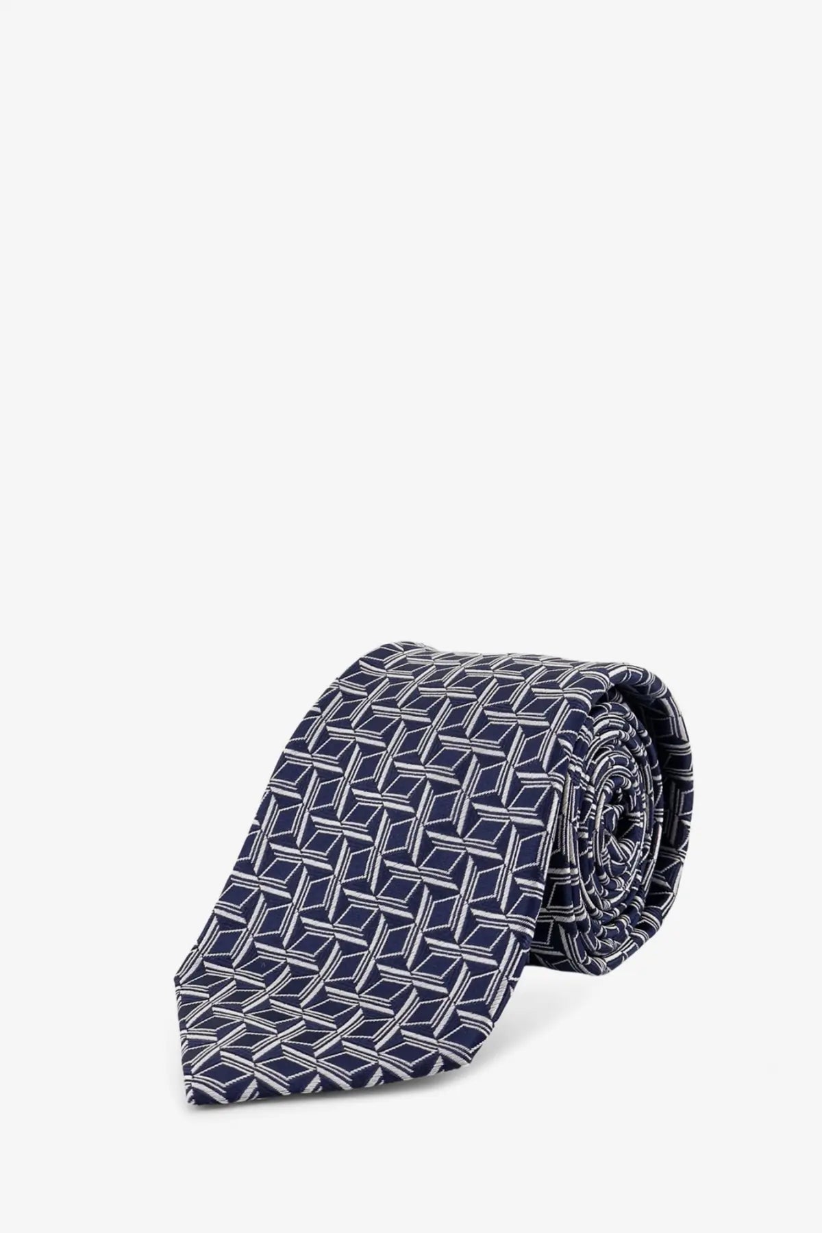 A navy blue silk tie by Kiton featuring a geometric pattern of interlocking white diamond shapes
