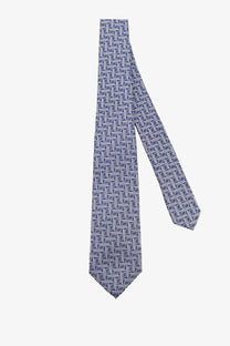 Kiton men’s silk tie in navy blue with a subtle white geometric pattern perfect for formal wear