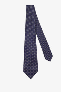 Kiton men’s silk tie in navy blue with a subtle pattern of small white crosses perfect for formal wear