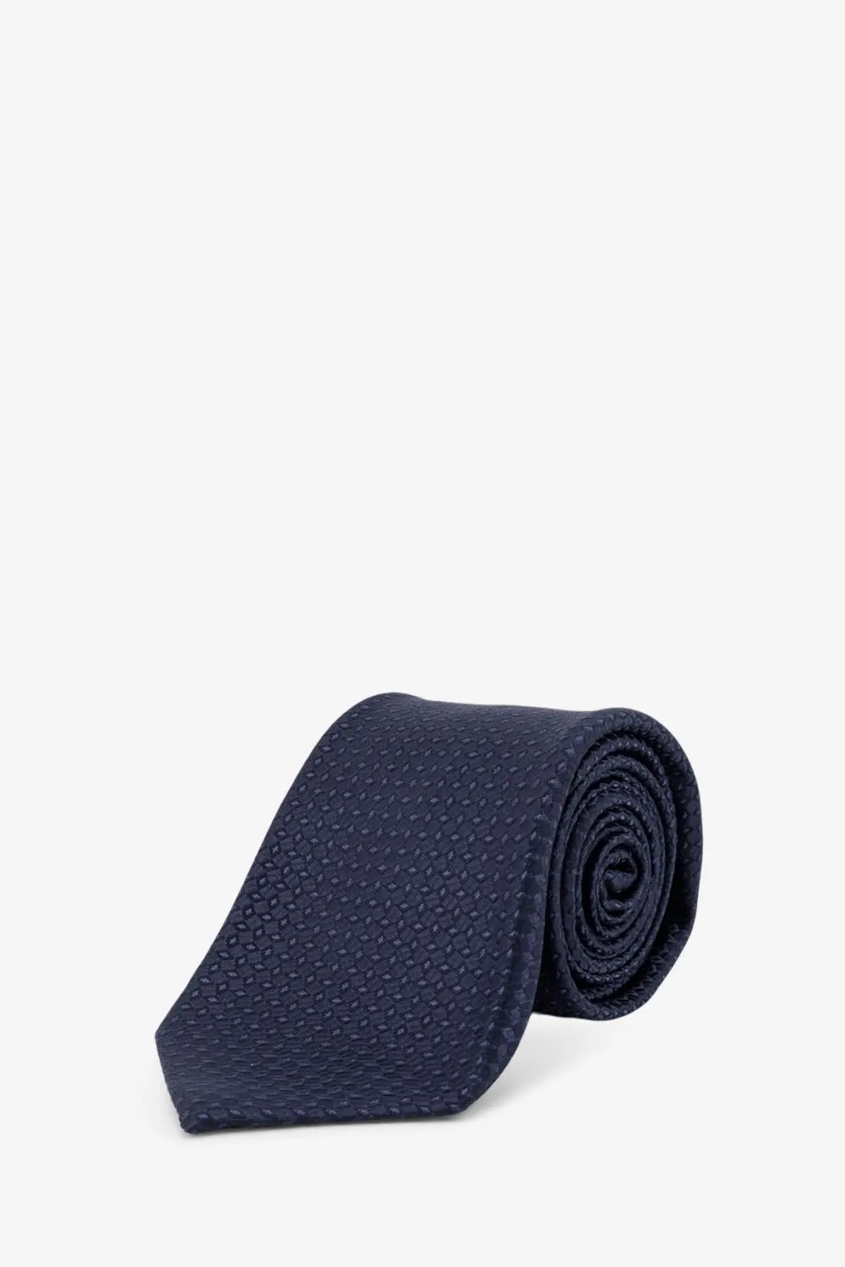 Kiton men’s silk tie in navy blue with a subtle textured pattern rolled neatly for display