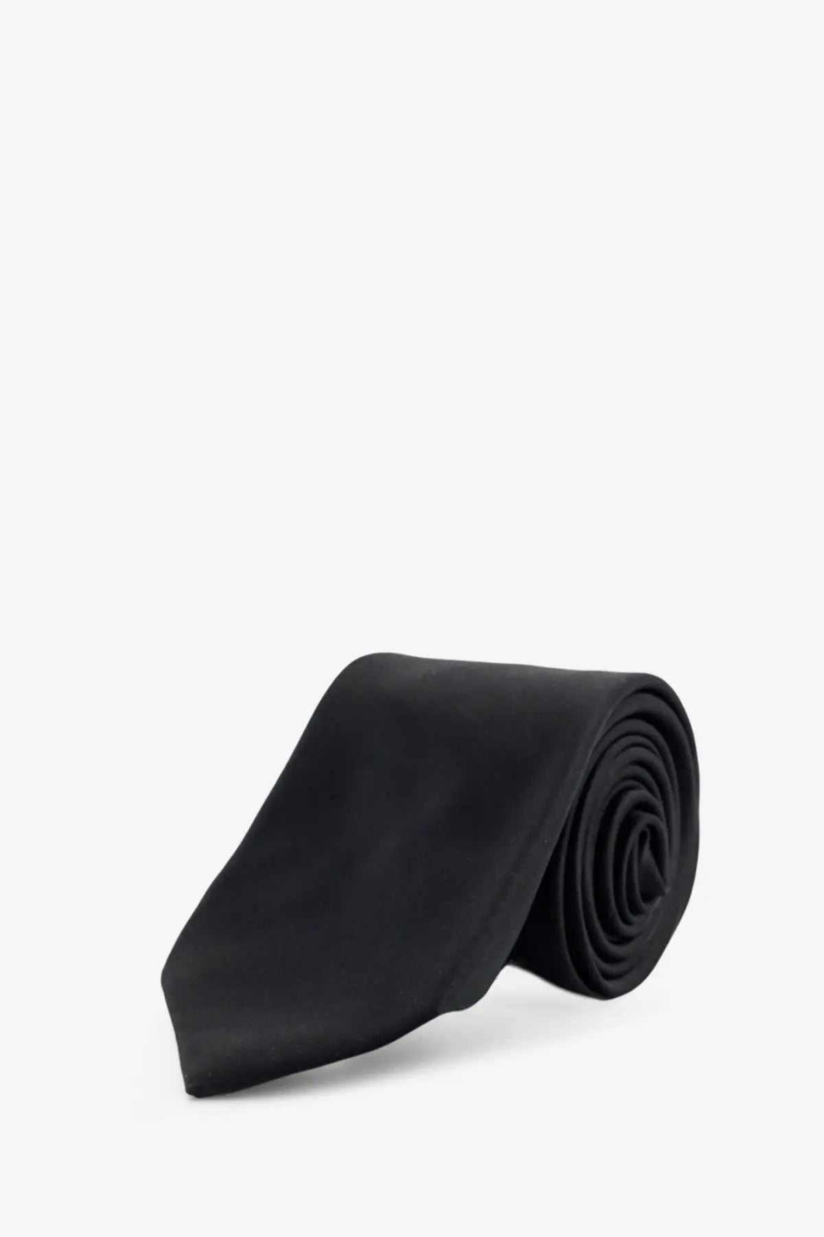 A sleek black kiton men’s silk tie neatly rolled on a plain background showcasing its smooth texture