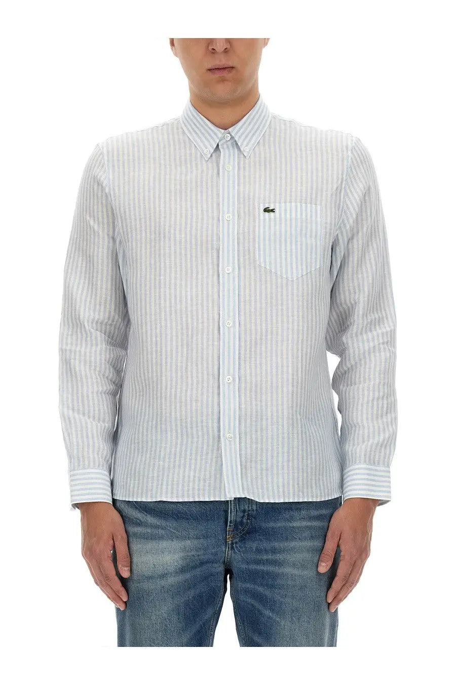 Lacoste men’s shirt in light blue and white vertical stripes with long sleeves and green crocodile logo on chest pocket