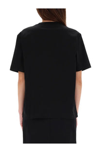 Lacoste women’s black short-sleeved shirt featuring a simple minimalist design perfect for casual wear