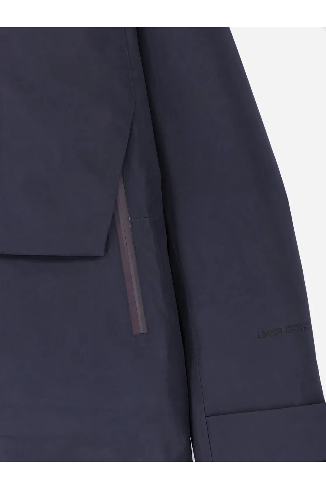 Laminar men’s waterproof jacket black in dark gray with subtle tonal zipper pull and minimalist sleeve branding