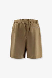 Back view of laminar men’s wool blend bermuda shorts in beige with elastic waistband and small zippered pocket