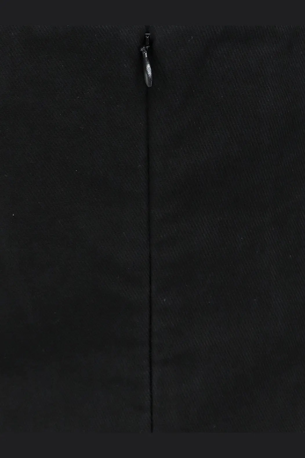 Black lamrons women’s cotton and silk blend top showing central zipper pull on front black fabric
