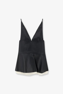Lamrons women’s black leather top featuring a black satin camisole with deep v-neckline and flared skirt hem