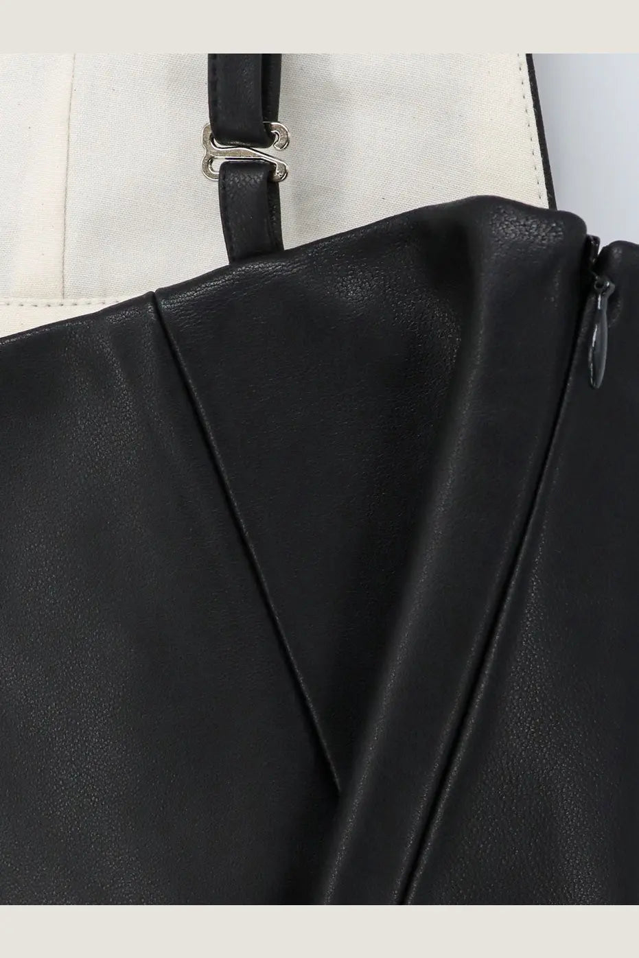 Lamrons womens leather top black shoulder bag in black leather with silver toned metal clasp and zipper closure
