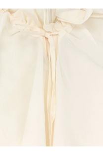 Lamrons women’s white modal and silk blend top with soft cream lightweight fabric and delicate tied waistband