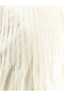 A delicate ivory pleated skirt with subtle vertical stitching made of lightweight flowing fabric