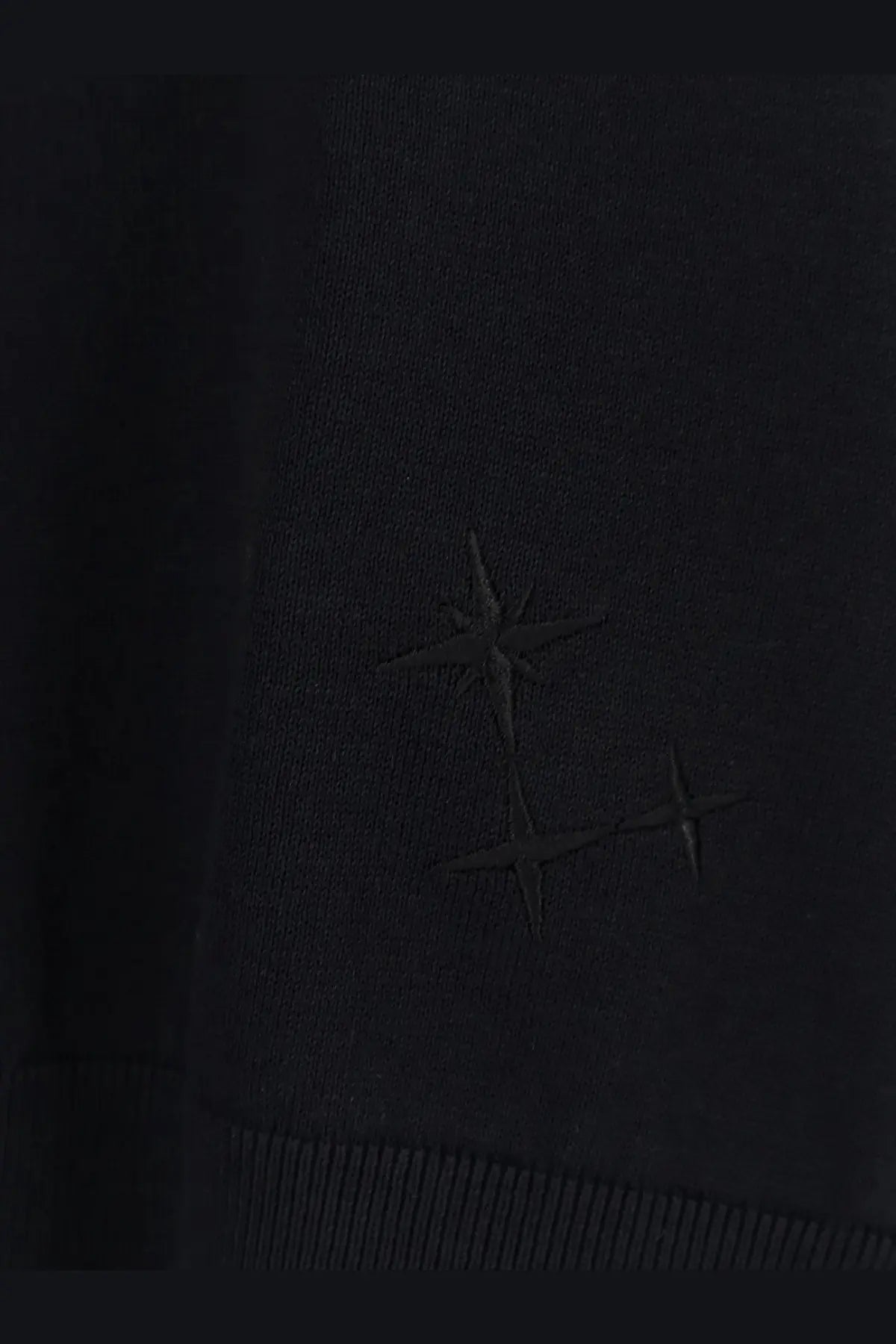 Laneus men’s black cotton knit sweater with subtle embroidered star motifs on the front