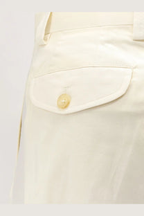 Cream-colored button detail on white fabric pocket of laneus men’s stretch cotton trousers white