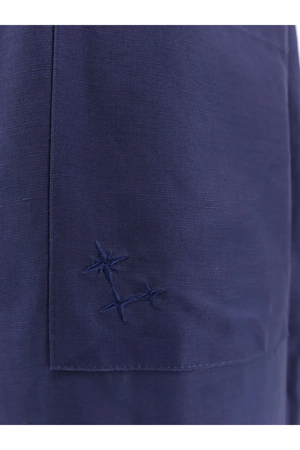 Dark blue linen pocket with subtle embroidered star motifs on laneus mens viscose and linen trousers blue