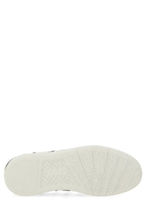 Lanvin men’s sneaker clay white with white rubber sole featuring textured tread and circular design near the heel back view