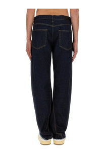 Lanvin men’s twisted jeans in dark indigo denim with contrasting light stitching and a straight-leg cut