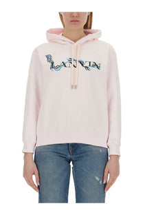 Pink lanvin women’s sweatshirt with blue and black embroidered logo on chest in a comfortable hoodie fabric