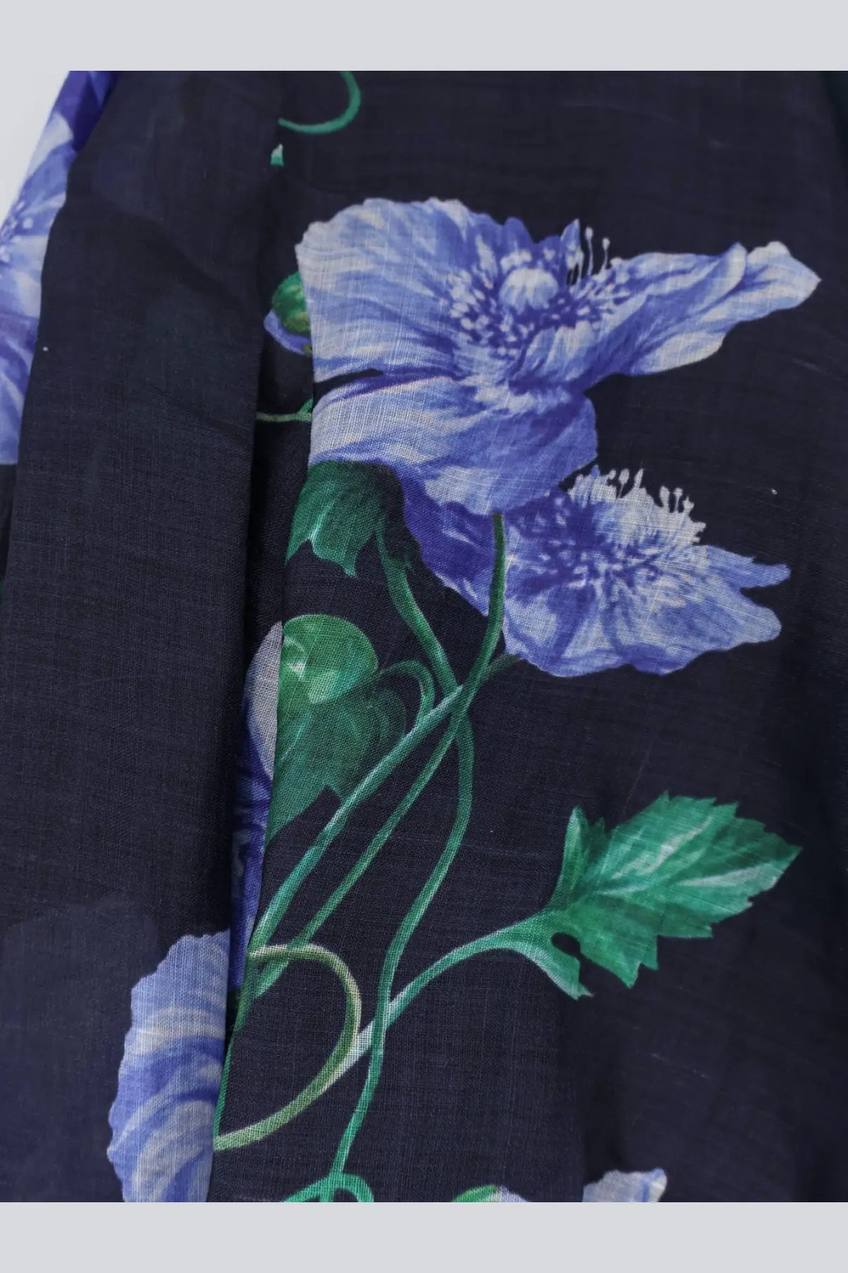 Black fabric scarf with vibrant blue poppy and green leaf pattern paired with lavi womens cactus ramie shirt blue