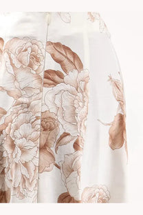 Lavi women’s Debby cotton trousers beige featuring a flowing white skirt with delicate beige and brown floral pattern