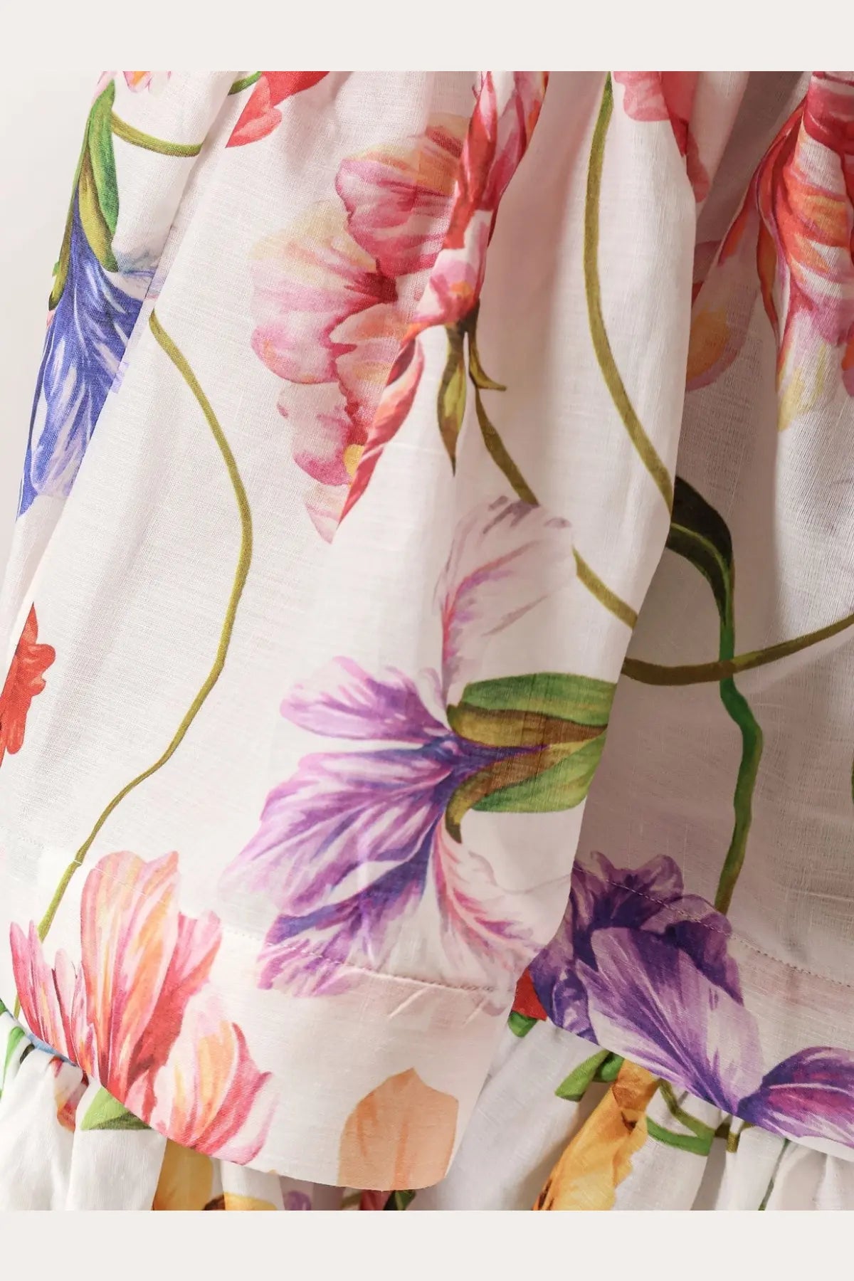 Lavi women’s picciré flounced long skirt beige with a white floral pattern of pink purple and blue blossoms on green stems