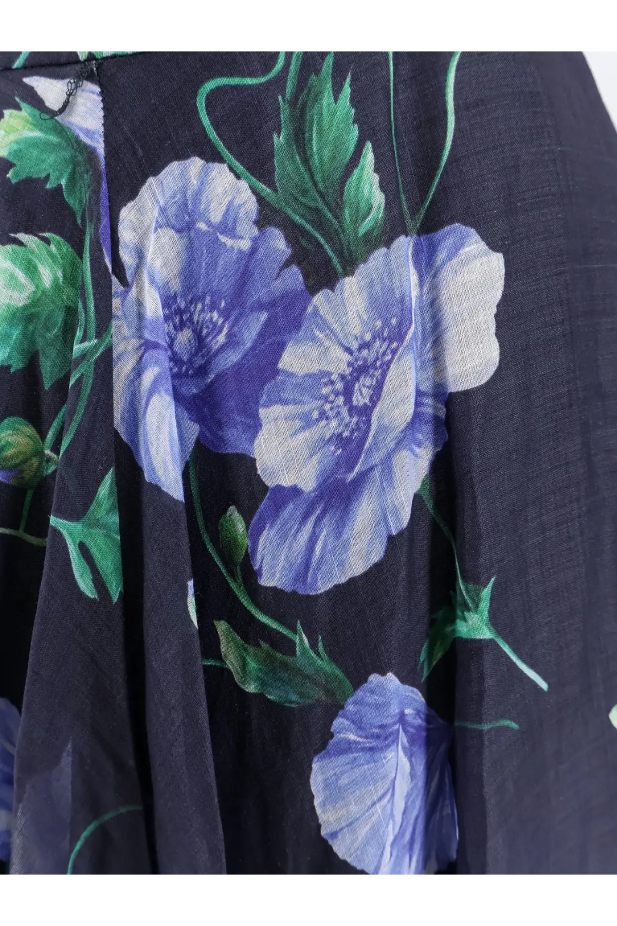 Lavi women’s plumeria ramie dress blue featuring a dark blue skirt with vibrant purple and white poppy floral pattern
