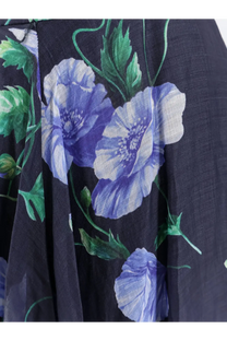 Lavi women’s plumeria ramie dress blue featuring a dark blue skirt with vibrant purple and white poppy floral pattern