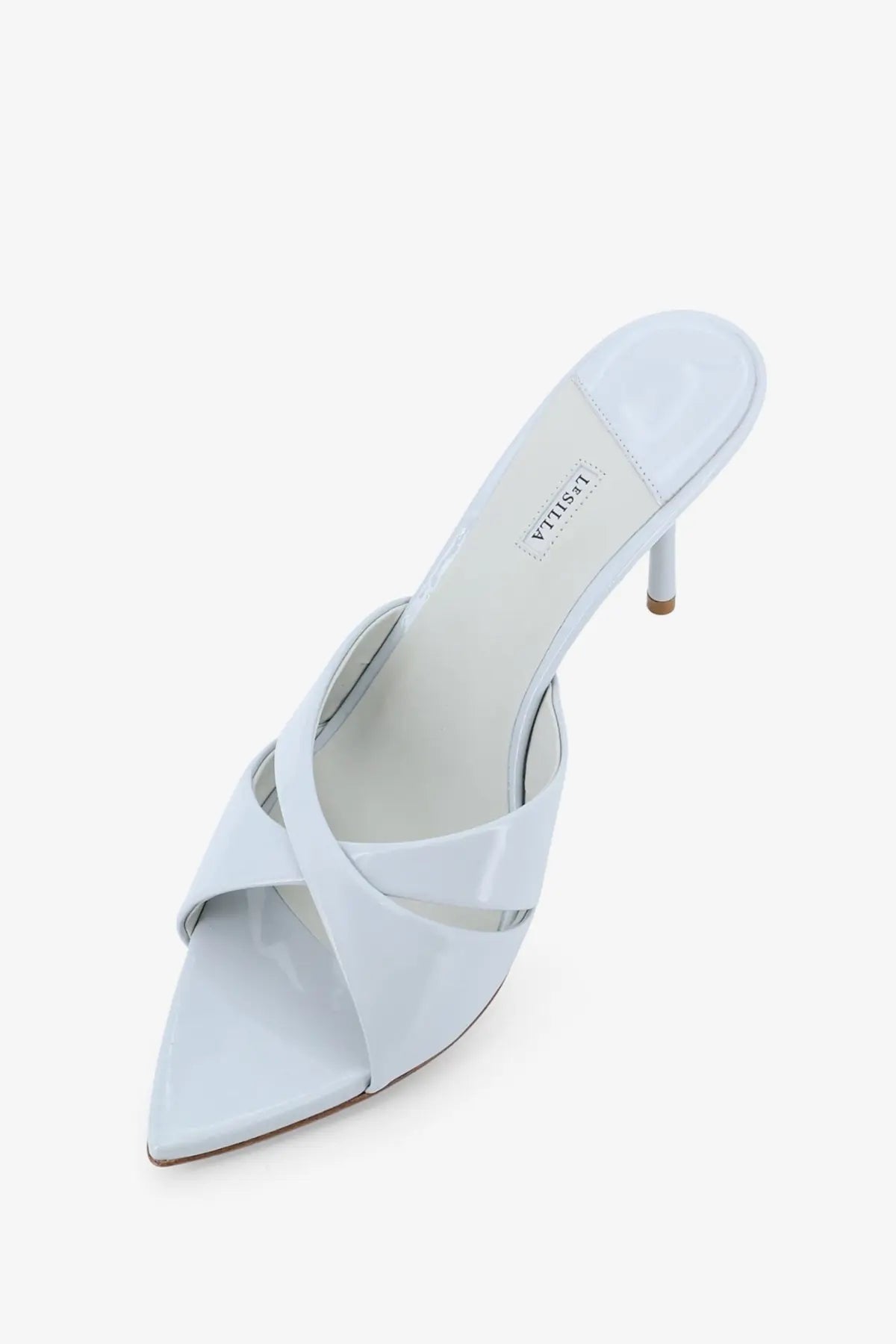 Le silla women’s shirley patent leather sandals halo featuring sleek glossy white pointed toe mules with crisscross straps
