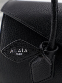 ALAÏA Women's Le Teckel Flap Leather Handbag Black, view 5