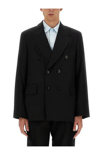 Our Legacy men’s black double-breasted blazer with dark buttons and notched lapels in premium fabric