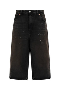 Our Legacy men’s capri cut shorts in green distressed denim with high waist and wide legs front view