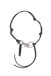 Our legacy men’s ladon necklace black featuring a black leather cord keychain with silver metal clasp and small strap attachment