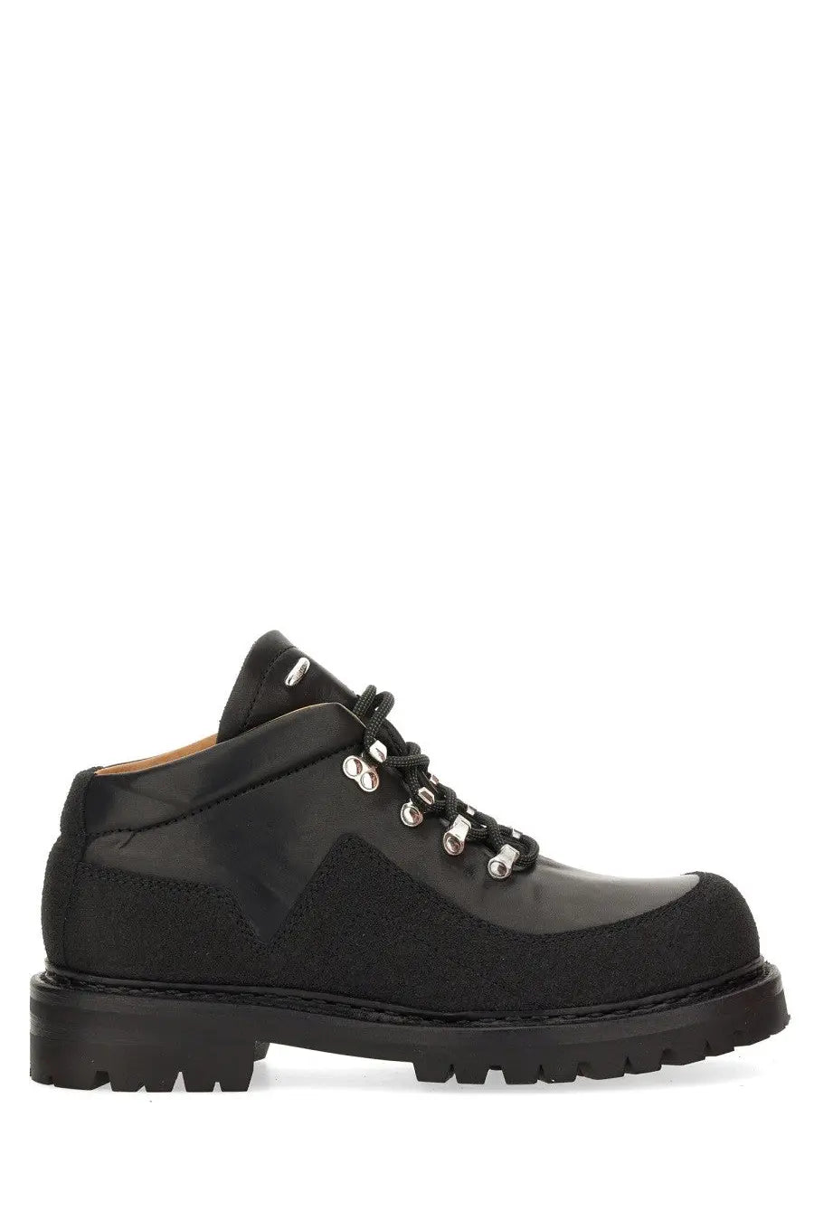 Our Legacy men’s leather quest shoe in black features suede and leather with silver toned eyelets for hiking use
