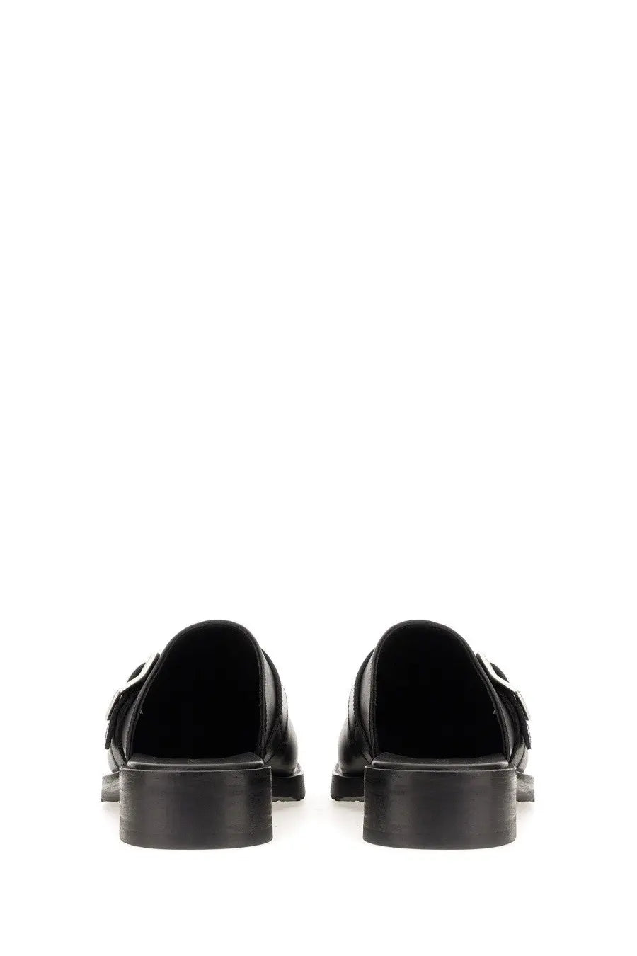 Our legacy men’s mule camion black leather mules with sleek minimalist design and chunky soles front view