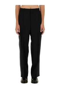 Our Legacy men’s pantalone borrowed black tailored trousers with straight-leg cut and subtle pleats at the waistband