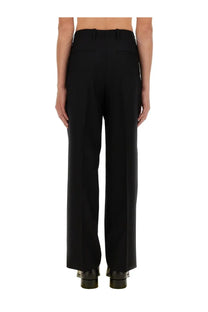 Black tailored trousers with a straight-leg cut and structured waistband from Our Legacy mens pantalon borrowed black