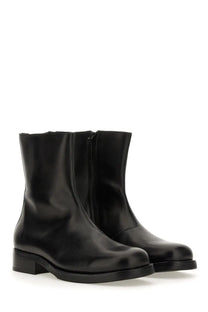 Our legacy men’s stivale camion black black leather ankle boots with low block heel and zipper closure