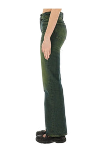 Our Legacy women’s boot cut Malibu jeans green are dark green high-waisted flared denim jeans with a faded wash and five pockets